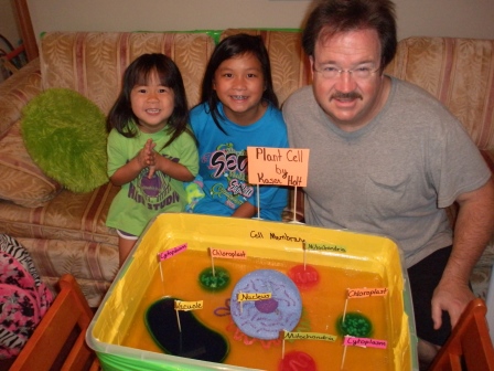 Kasen and her science project(plus helpers Daddy and Karis)